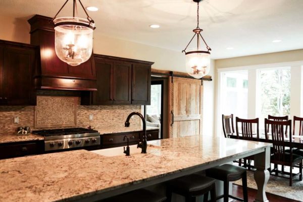 Reclaimed Sliding Barn Door Two Panel Door Dark Cabinets