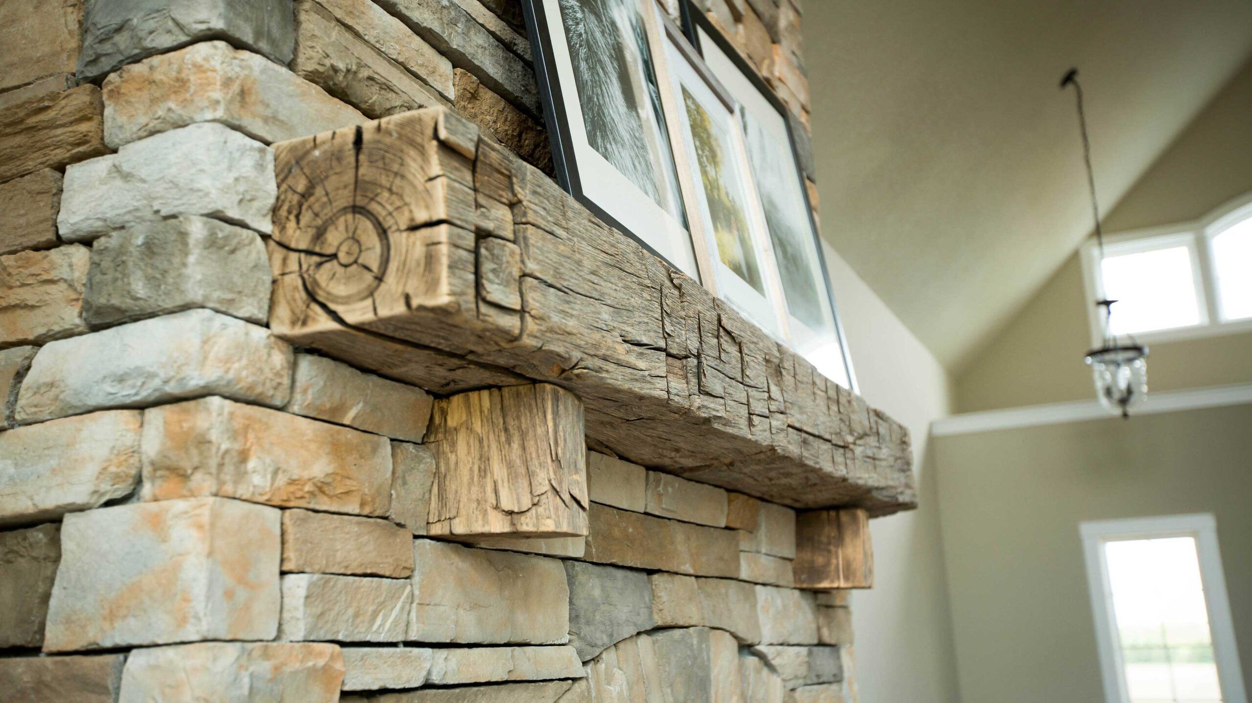 gray reclaimed barn wood beam fireplace mantel